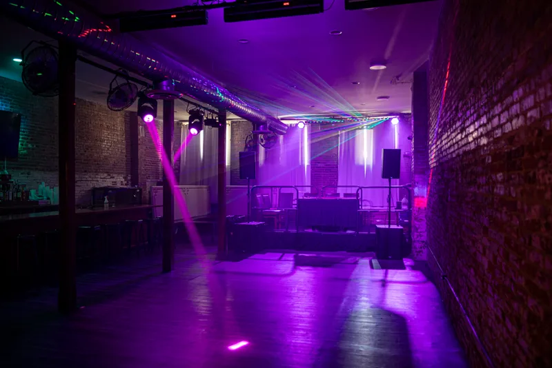 The upstairs room under the house lights before doors