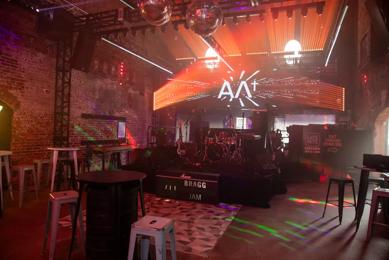 The upstairs room set up for a private event at Late Nite